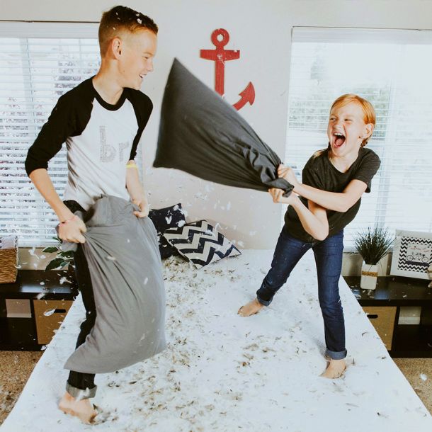 Two kids enjoying Pillow Fight